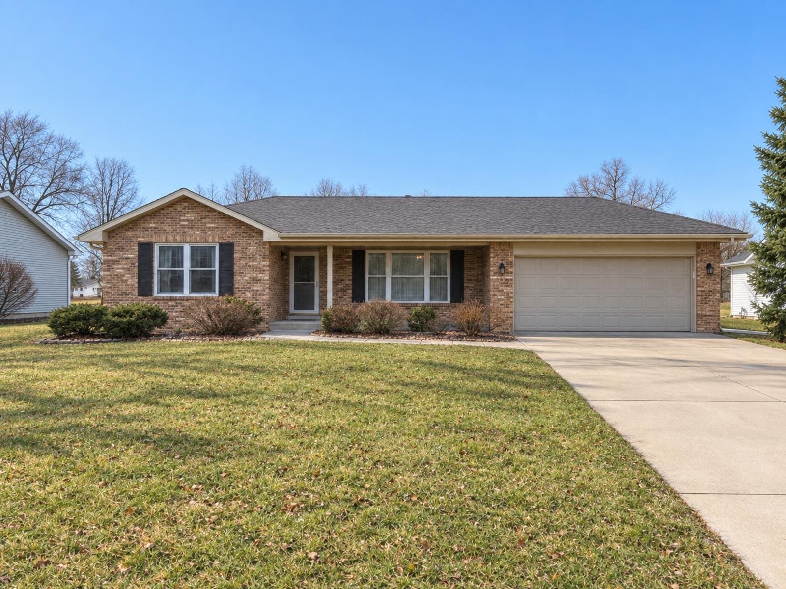 Brick ranch home on a bright day
