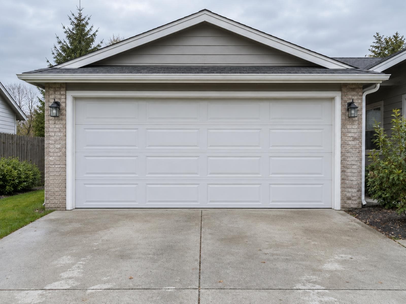 The same garage door and driveway cleared of the bins, bikes and boxes after Remove Clutter